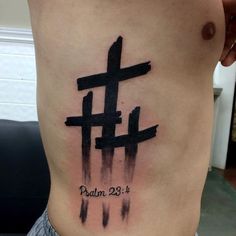 a person with a cross tattoo on their stomach and the words paul 29 1 - 4