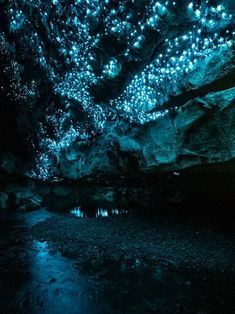 a cave filled with lots of blue lights