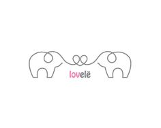 two elephants that are standing next to each other with the word love written on them