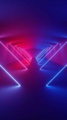 an abstract photo with neon lights in the middle and blue, pink, and red colors