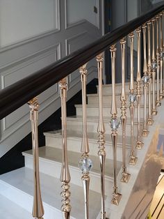 a stair rail with glass beads on it