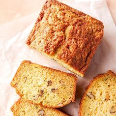 slices of banana bread sitting on top of a piece of wax paper