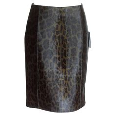 Guaranteed authentic Prada leopard print calf hair skirt with rich gloss. Stitch detail for seams skirt. Hidden side zip. Rear vent. NEW or NEVER WORN. final sale SIZE 40 USA SIZE 6 SKIRT MEASURES: LENGTH 22" WAIST 15" HIP 18.25" CONDITION: NEW or NEVER WORN Prada Skirt, Embellished Skirt, Skirt Pencil, Black Hand, Calf Hair, Skirts For Sale, Hand Beading, Clothing Patterns, Pencil Skirt