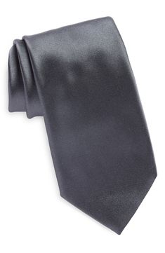 Bring upscale polish to business or formal attire with an Italian-made tie crafted from lustrous silk in a solid hue. 100% silk Dry clean Made in Italy Classic Satin Suit And Tie Accessories, Classic Fitted Satin Suit And Tie Accessories, Elegant Satin Ties For Business, Silk Ties For Work, Elegant Satin Suit And Tie Accessories For Business, Elegant Solid Standard Tie For Suits, Elegant Standard Tie With Satin Finish, Classic Solid Ties For Work, Classic Satin Tie With Satin Finish