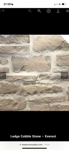 a stone wall with the words ledge cobble stone