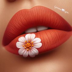 a woman's lips with flowers painted on the top and bottom of her lip