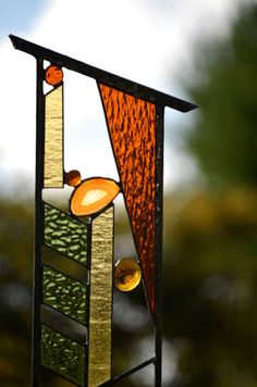 a close up of a stained glass decoration