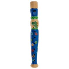 a wooden toothbrush holder with dinosaurs on it's sides and a green rubber band around the mouth