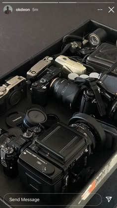 many different types of cameras in a black box