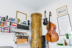 a room filled with musical instruments and books