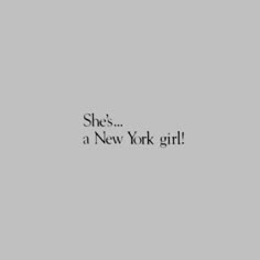 the words she's a new york girl in black and white on a gray background