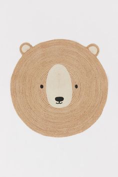 a brown bear rug on a white background