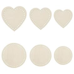 six white heart shaped cut outs