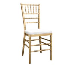 a wooden chair with a white seat cushion