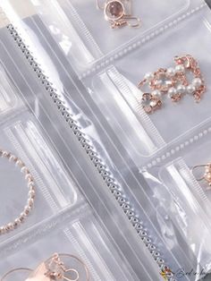 several different types of jewelry in clear plastic bags