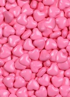 pink candy hearts are shown in close up