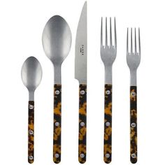 five forks, two spoons and one knife with skulls on them are arranged in a row