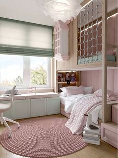 a bedroom with pink rugs and white furniture