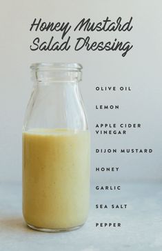 a glass jar filled with liquid sitting on top of a table