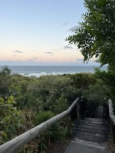 stairs lead down to the beach and ocean