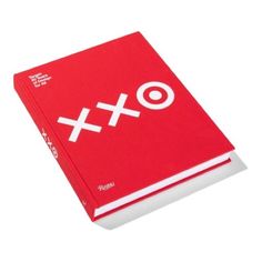 a red book with white letters on the front and back cover that says xo