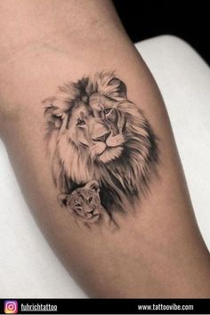 a lion and cub tattoo on the arm