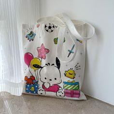 Step into a world of adorable charm with our Kawaii Cartoon Sanrio Character Print Tote Bag, the ultimate accessory for any anime enthusiast or lover of all things cute. This canvas bag features vibrant and delightful Sanrio characters that will bring joy to your everyday errands, making it not just a tote but a statement piece that stands out in any crowd.