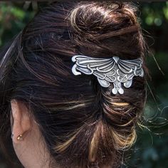 This beautiful piece is a perfect example of the Art Nouveau style, in which organic forms and geometric patterns flow from one to the other. The Art Nouveau Leaf barrette is a truly special piece. You will appreciate the unique design, the sturdy clip and the many compliments you'll receive when you wear it. Hand crafted at our studio shop in Santa Rosa, California, USA. New 'Clio Clip' hair clip mechanism makes these better than ever! Clip Size: 80 mm; Overall Dimensions: 3.85 x 1.75 inches; W Art Nouveau Hair, Leaf Hair Clip, Art Nouveau Fashion, Raven Jewelry, Design Art Nouveau, Santa Rosa California, French Clip, Dragonfly Jewelry, Design Hair