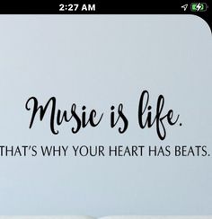 an open book with the words music is life that's why your heart has beats