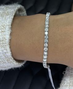 Indulge in luxury with this stunning 9.66 Ct F/VS-SI Top Quality Natural Round Diamond Tennis Bracelet in 18k White Gold. This handmade piece features a beautiful white/colourless diamond with excellent cut grade and very good cut, making it a perfect accessory for any occasion. The prong setting style and authentication certificate ensure the diamond's security and authenticity. Measuring 7 inches in length, this bracelet is perfect for nature-themed events or as a Valentine's Day, Christmas, w Diamond Earrings Studs Round, Vs1 Diamond, Colorless Diamond, Diamond Tennis Bracelet, Themed Events, Minimalist Bracelet, Tennis Bracelet Diamond, Nature Themed, Diamond Bracelets