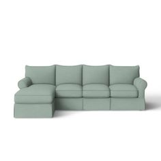 a small sectional sofa with a footstool