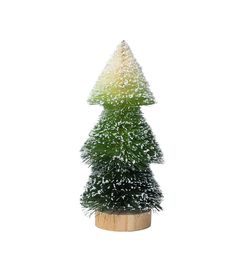 a small christmas tree sitting on top of a wooden stand in front of a white background