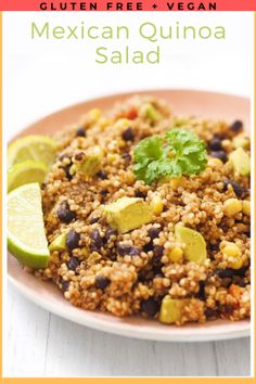 mexican quinoa salad on a plate with limes and cilantro