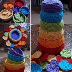 there are many different crocheted items on the table and one has a flower in it