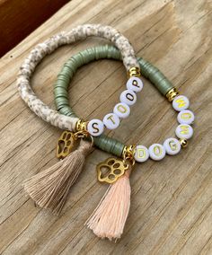 This bracelet is perfect for animal lovers & fur mamas! It is customized to read your pet's name, or I can also write dog mom/fur mom! It comes with a cute little paw print and tassel. It can be made without a tassel as well.  ⭐️The gold discs are 14k non-tarnish beads.  ⭐️I can make bracelets in any size! To find your perfect fit, see the measuring directions in the item pictures. ⭐️The heishi bead color can be changed. I can do the speckled brown as shown, or I have: 🐾plain brown/speckles brown 🐾speckled gray 🐾sage green 🐾light pink 🐾black with white speckles/plain black 🐾white/white with black speckles 🐾sky blue/royal blue 🐾mauve 🐾mint with black speckles 🐾olive green 🐾if you do not see a color you like, please message me. I have so many colors!  ⭐️Tassel Colors: 🐾brown (in Paw Print Bracelet, Heishi Bracelet, Mom Bracelet, Deer Season, Fur Mom, Moms Bracelet, Pet Name, Colors Brown, Heishi Beads