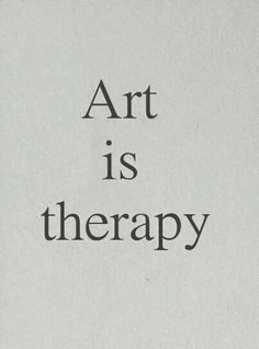 the words art is therapy written in black ink