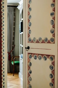 an open door with decorative designs on it