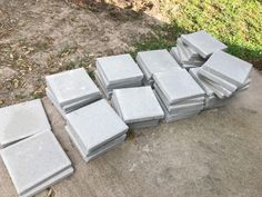 a pile of cement blocks sitting on the ground