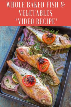 whole baked fish and vegetables in a pan with text overlay that reads whole baked fish and vegetables video recipe