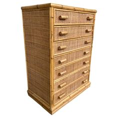 a wicker dresser with five drawers is shown in front of a white background,