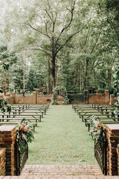 an outdoor ceremony set up with rows of chairs