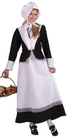 a woman dressed in a colonial costume holding a basket and wearing a white dress with black trim