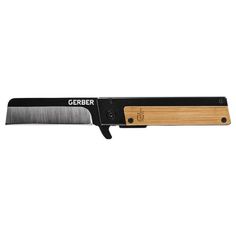 a knife that is sitting on top of a cutting board with the word cerber written on it