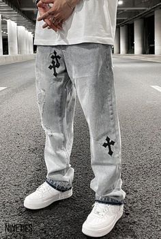 NTC® Ripped Retro Cross Jeans are the perfect blend of vintage-inspired style and modern comfort. These jeans feature a unique design with ripped details and a cross pattern on the front, adding a touch of edginess to your wardrobe. The high-quality denim fabric is both durable and stretchy, providing a comfortable fit Ripped Pants Outfit, Embroidery Trousers, Mens Embroidery, Men Streetwear Outfits, Denim Jeans Ideas, Cross Jeans, Ripped Pants, Pants Outfit Men, Trendy Boy Outfits