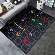 the rug is designed to look like an arcade game