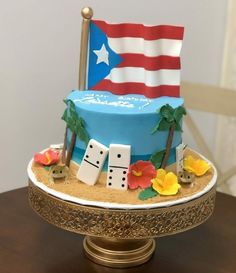 a cake decorated with dominos and an american flag