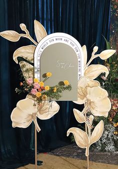 a mirror that has flowers on it