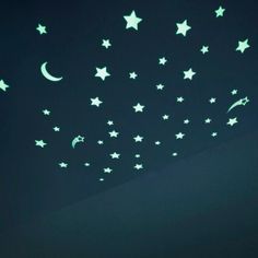 stars and crescents glow in the night sky with moon and star wall decals