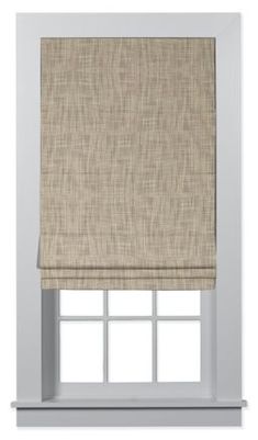 a beige roman blind in front of a window