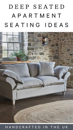 a white couch sitting in front of a window with the words deep seated apartment seating ideas handcrafted in the uk